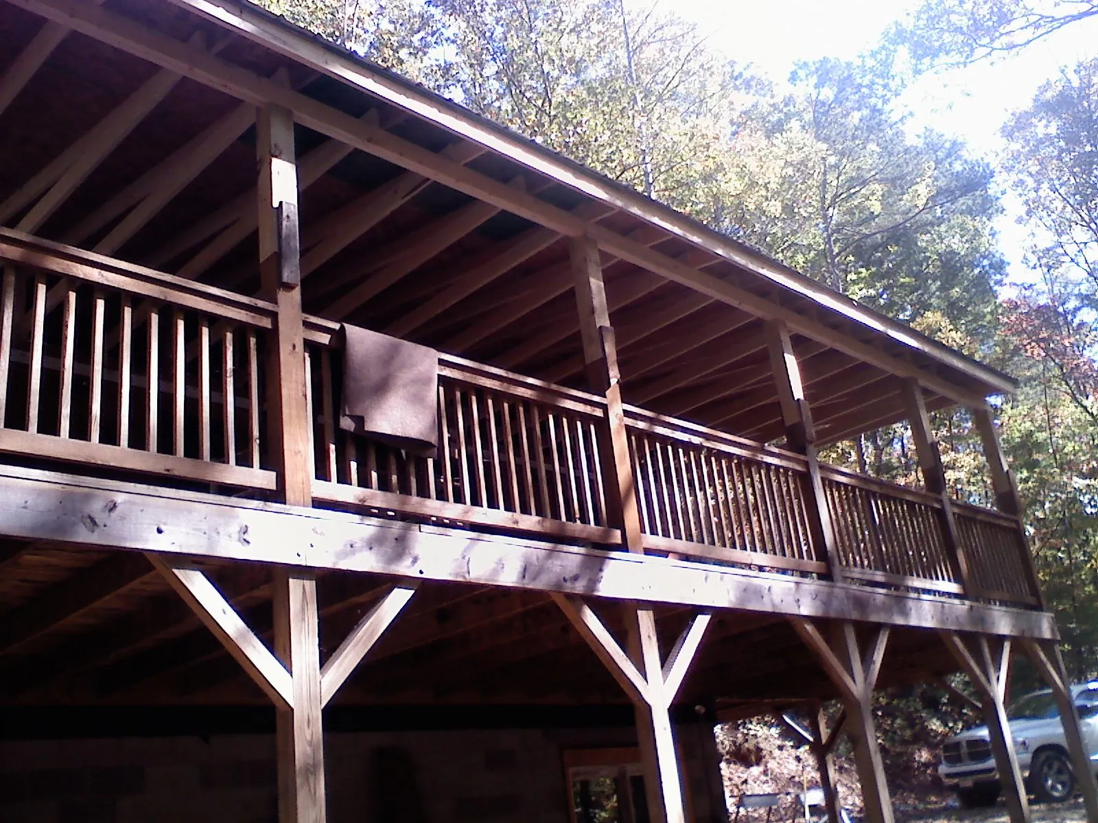 Timber framing under a new elevated porch and deck — Roof Leak Repair in Rancho Cucamonga by Roofing Brothers